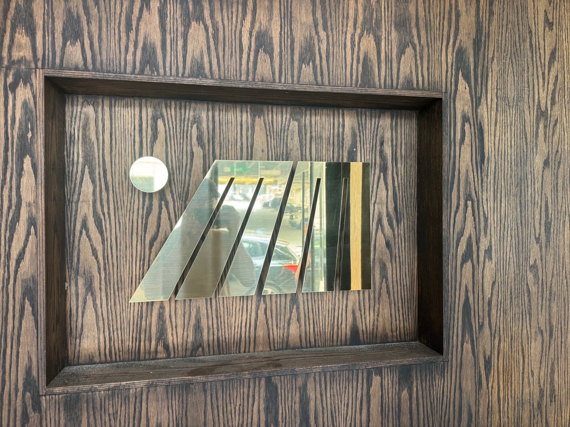 Laser cut brass custom signage from HM metalworks